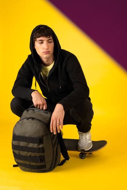 Trendy rugzak met skateboardvak