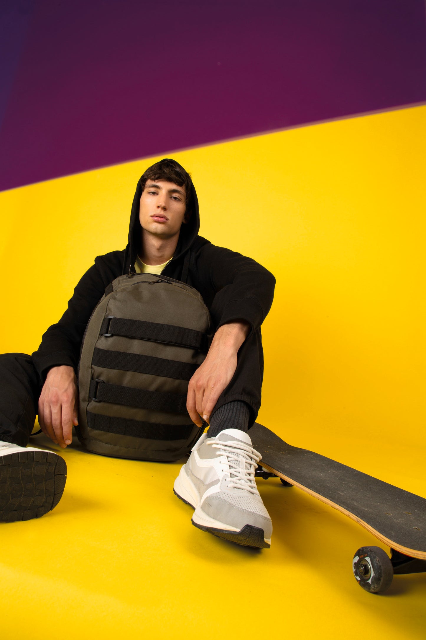 Trendy rugzak met skateboardvak